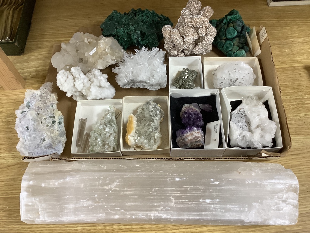 A group of mineral specimens, including two malachite specimens